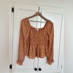 Floral smocked blouse